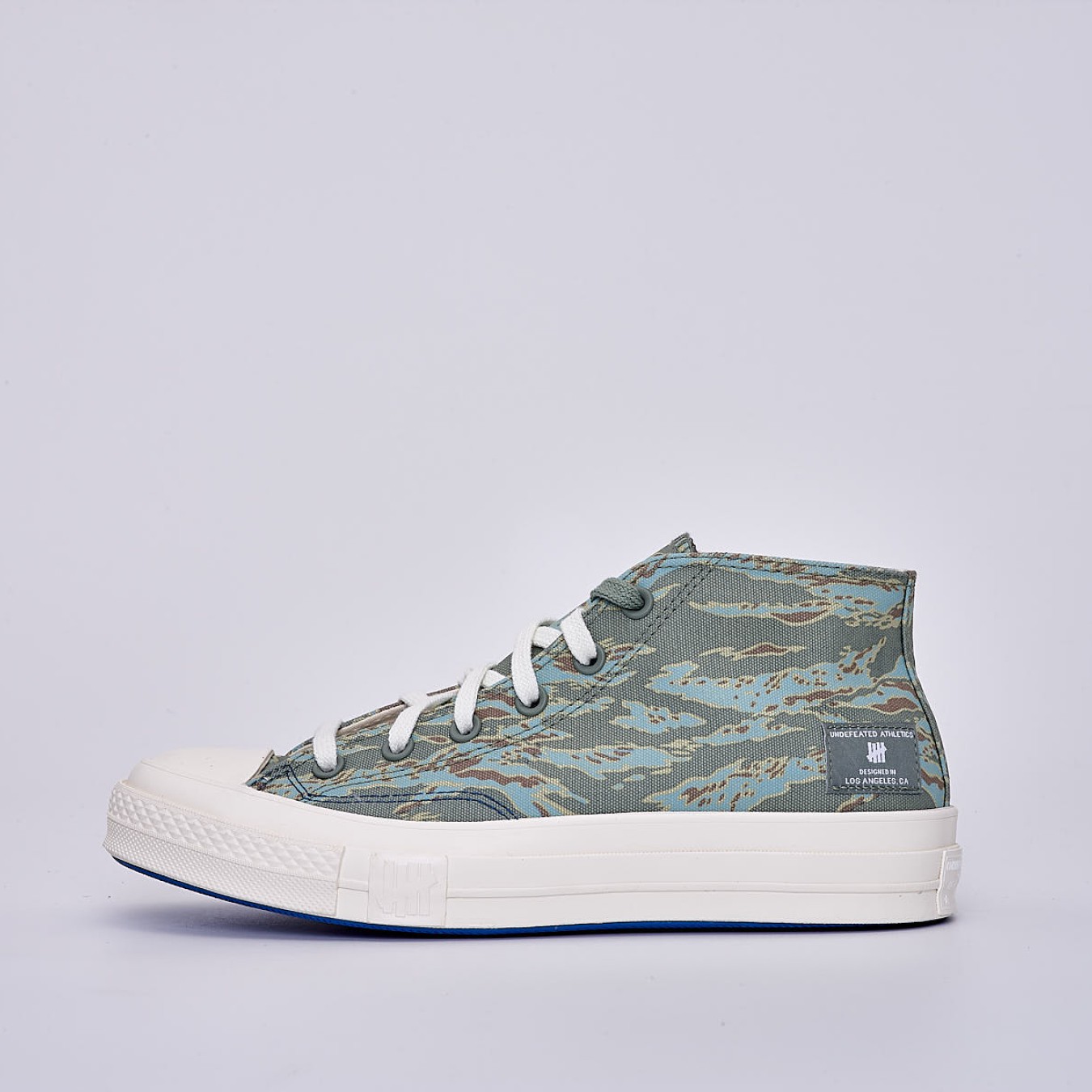 Converse X Undefeated Chuck 70 Mid